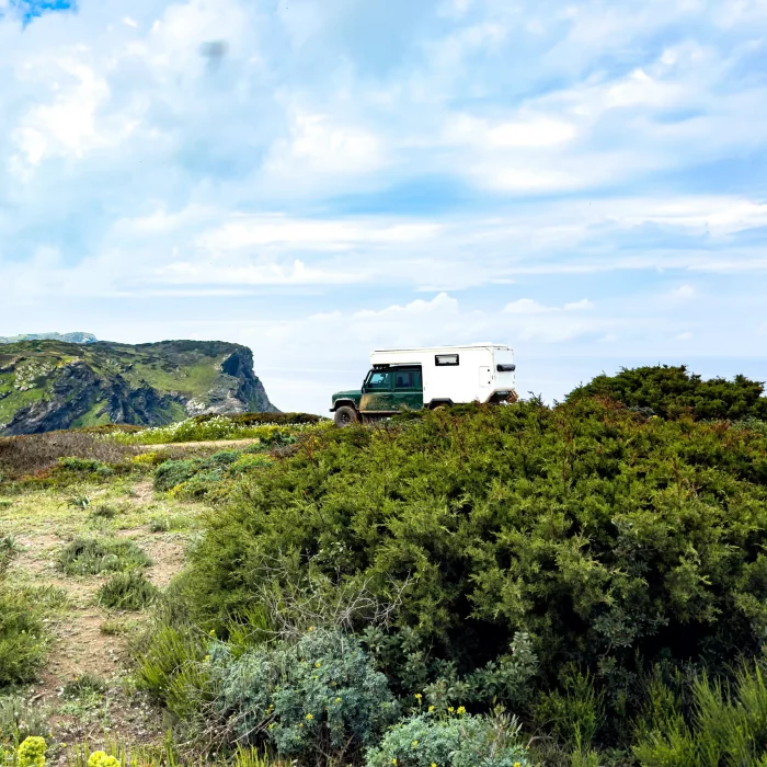 Sardinia off road trails: wild 4x4 bivouac facing a secluded cove