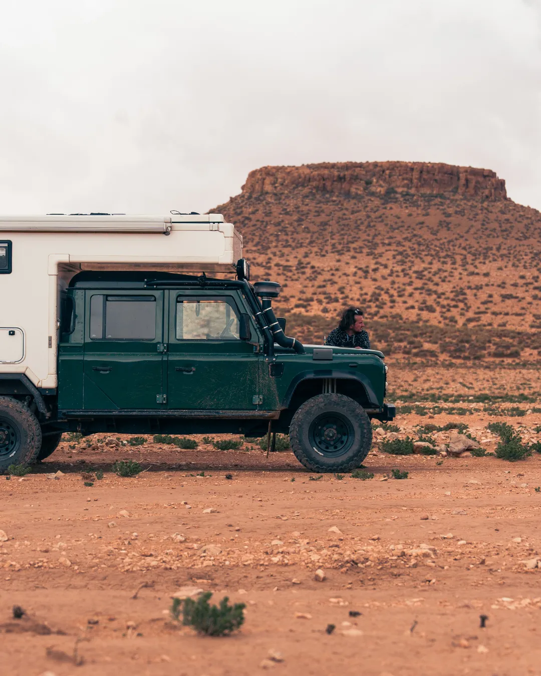 Morocco roadbook: Defender 130 on a track in southern Morocco